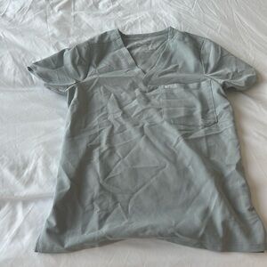 Womens figs one pocket scrub top size XS- color silver arrows